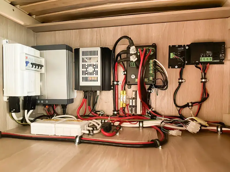 Neatly wired caravan 12V and 240V system with battery charger, inverter and fused distribution